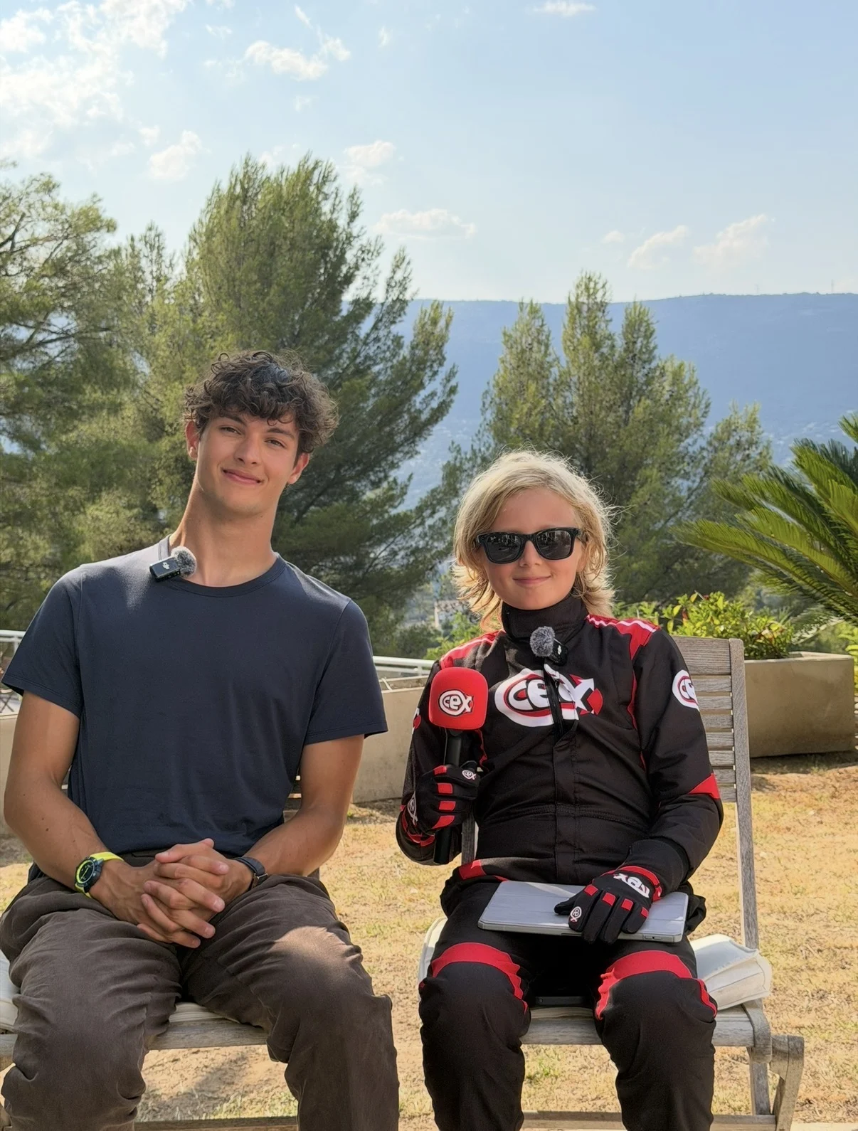 Rocco J Isted in his CeX racing suit with Formula One driver Ollie Bearman